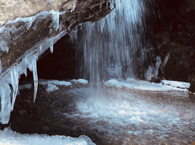 Inside Donut Falls with ice
