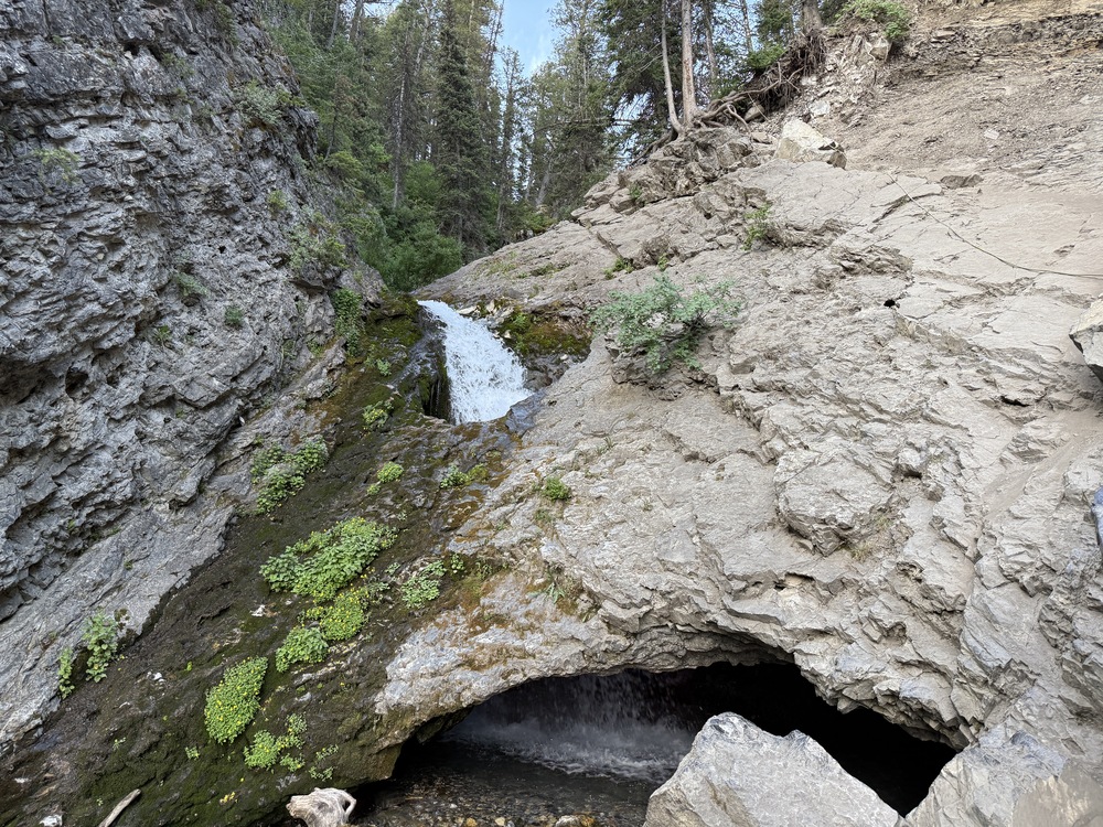 Where the water enters and exits the Donut Falls cave