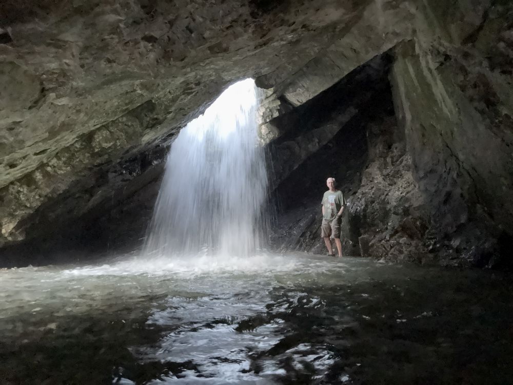 Old Hiking Dude (Sam Chapman) inside the cave at Donut Falls