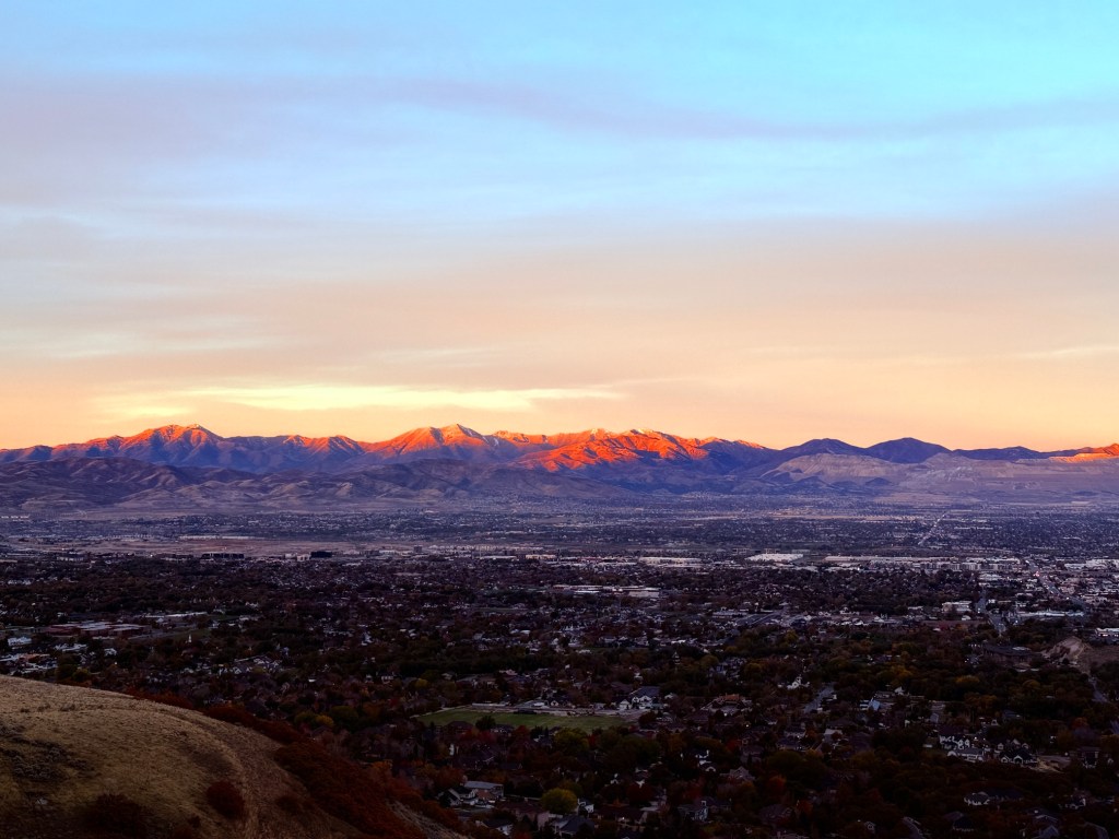 Sun rising on the Oquirrh Mountains from the Bonneville Shoreline Trail