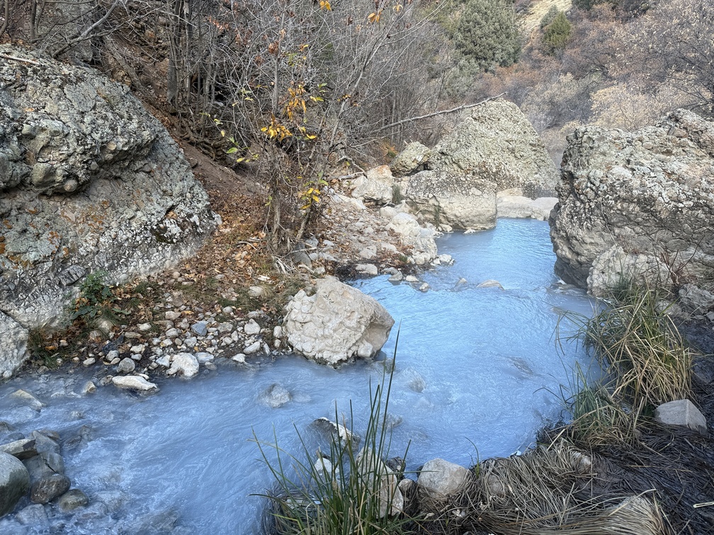 Gorgeous blue water below the hot springs