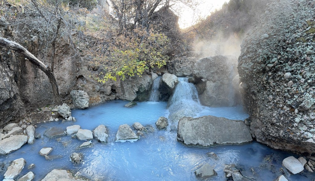 Fifth Water Hot Springs steaming waterfall