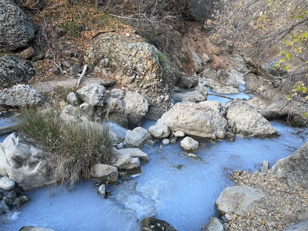 Milky blue water below the hot springs