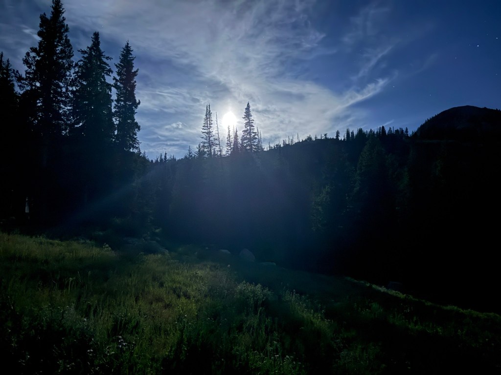 Full moon above the trail to Catherine Pass