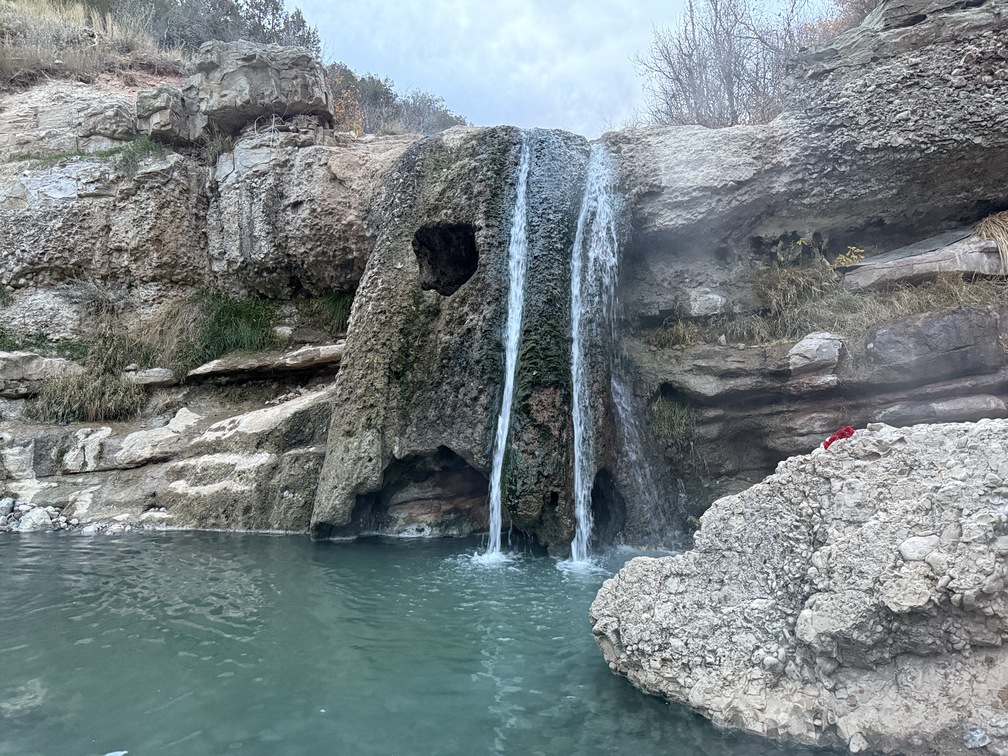 Waterfall by main hot springs pools