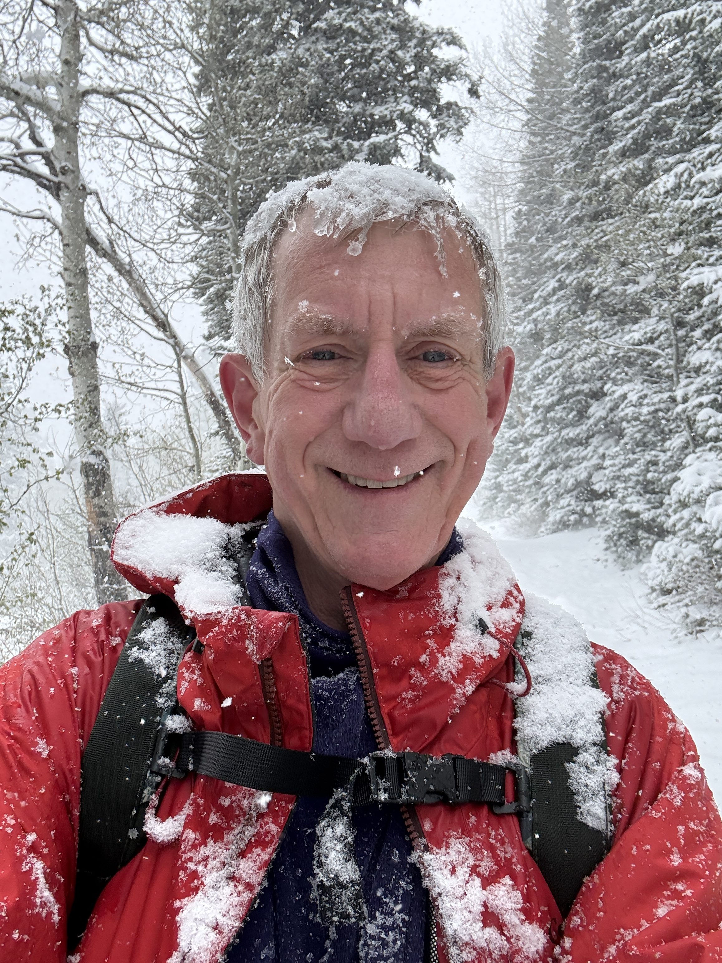 Old Hiking Dude covered in fresh snow